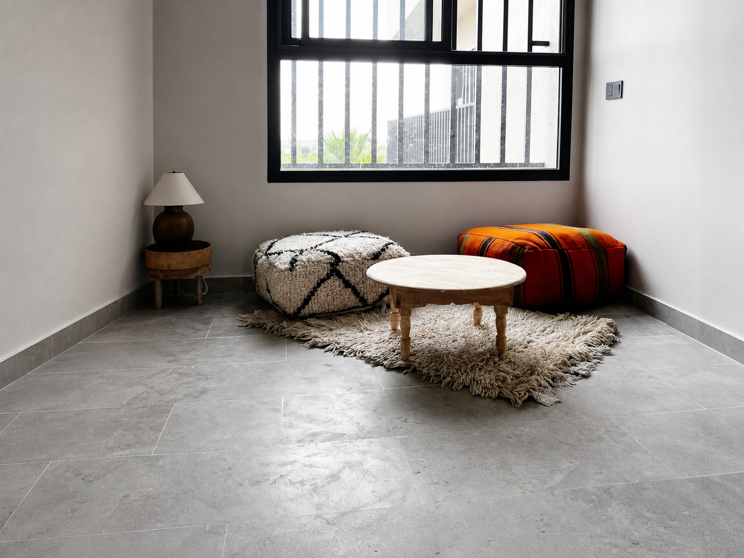 Avallon Grey floor in a light-filled sitting room