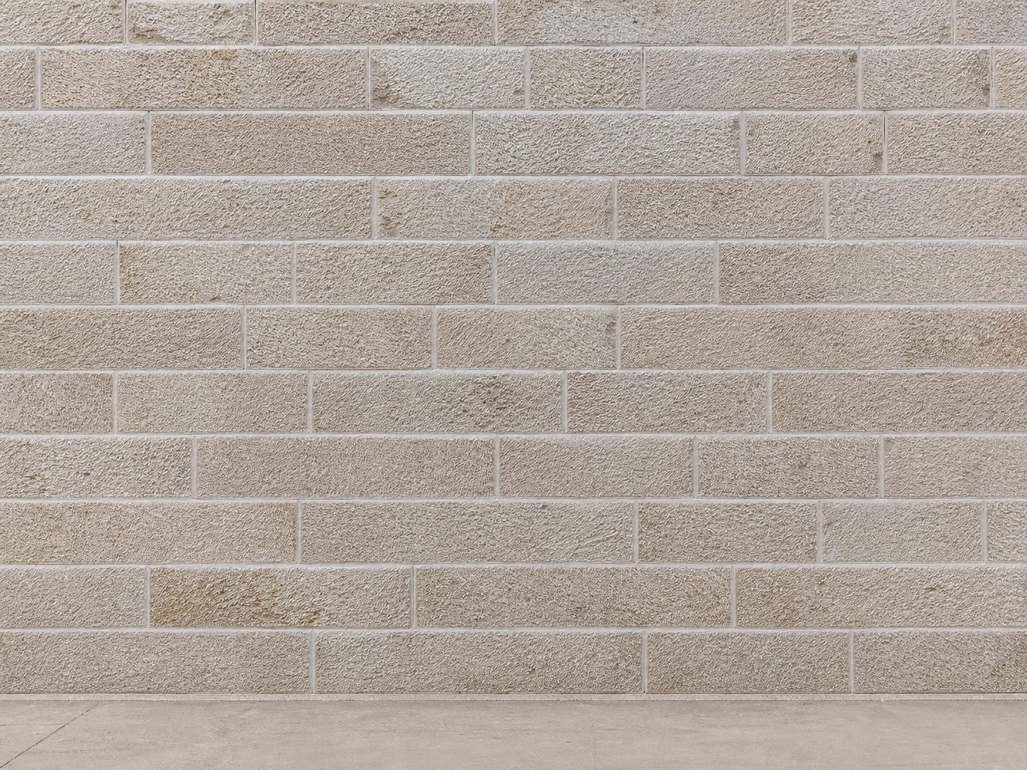 Wide elevation finished in Moroccan limestone