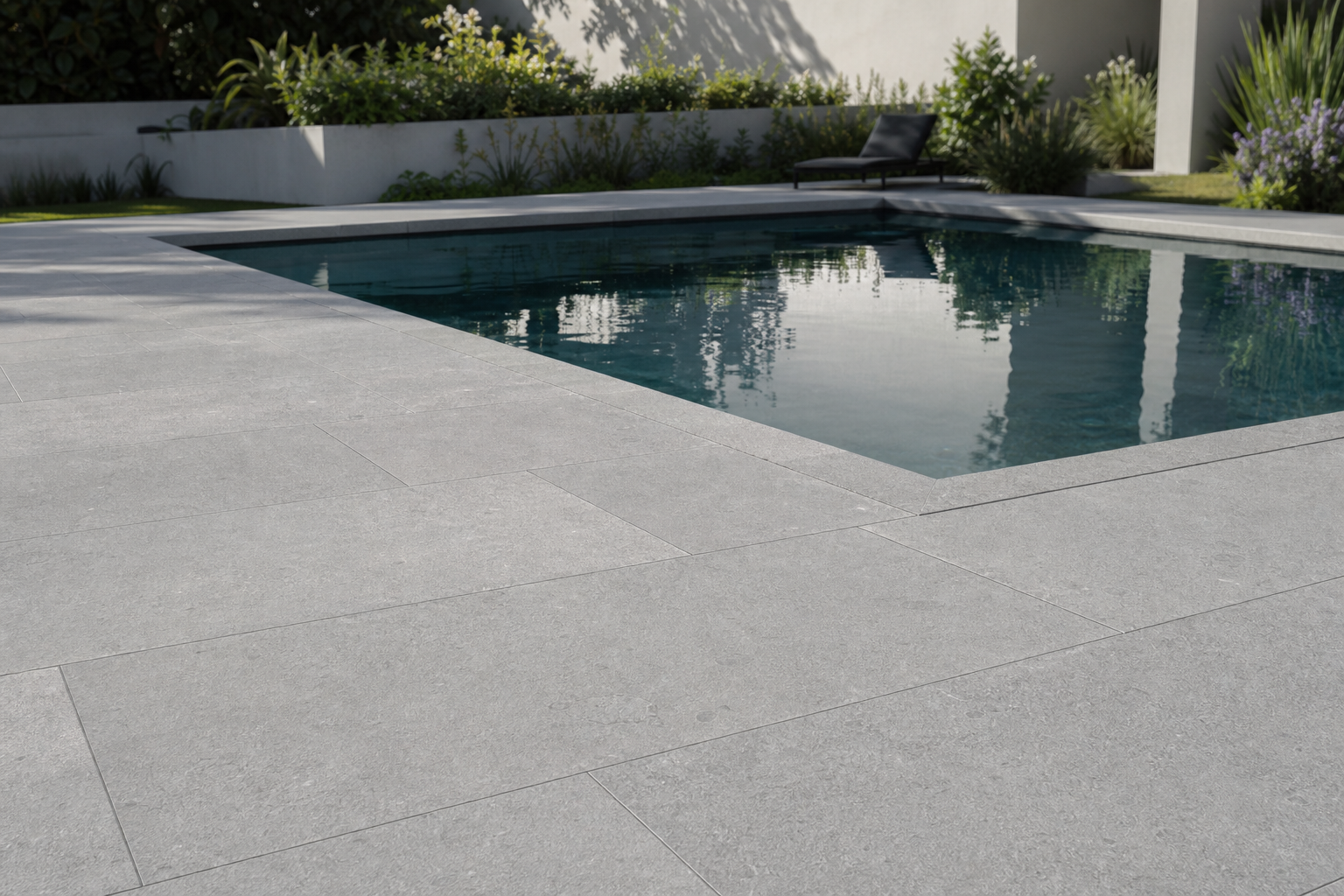 Casablanca Grey limestone paving around a contemporary garden pool