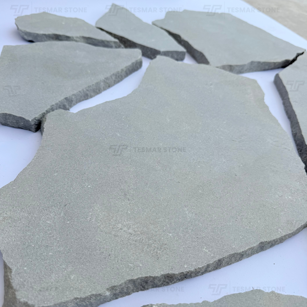 Close view of the surface and natural split edges of Avallon Grey limestone