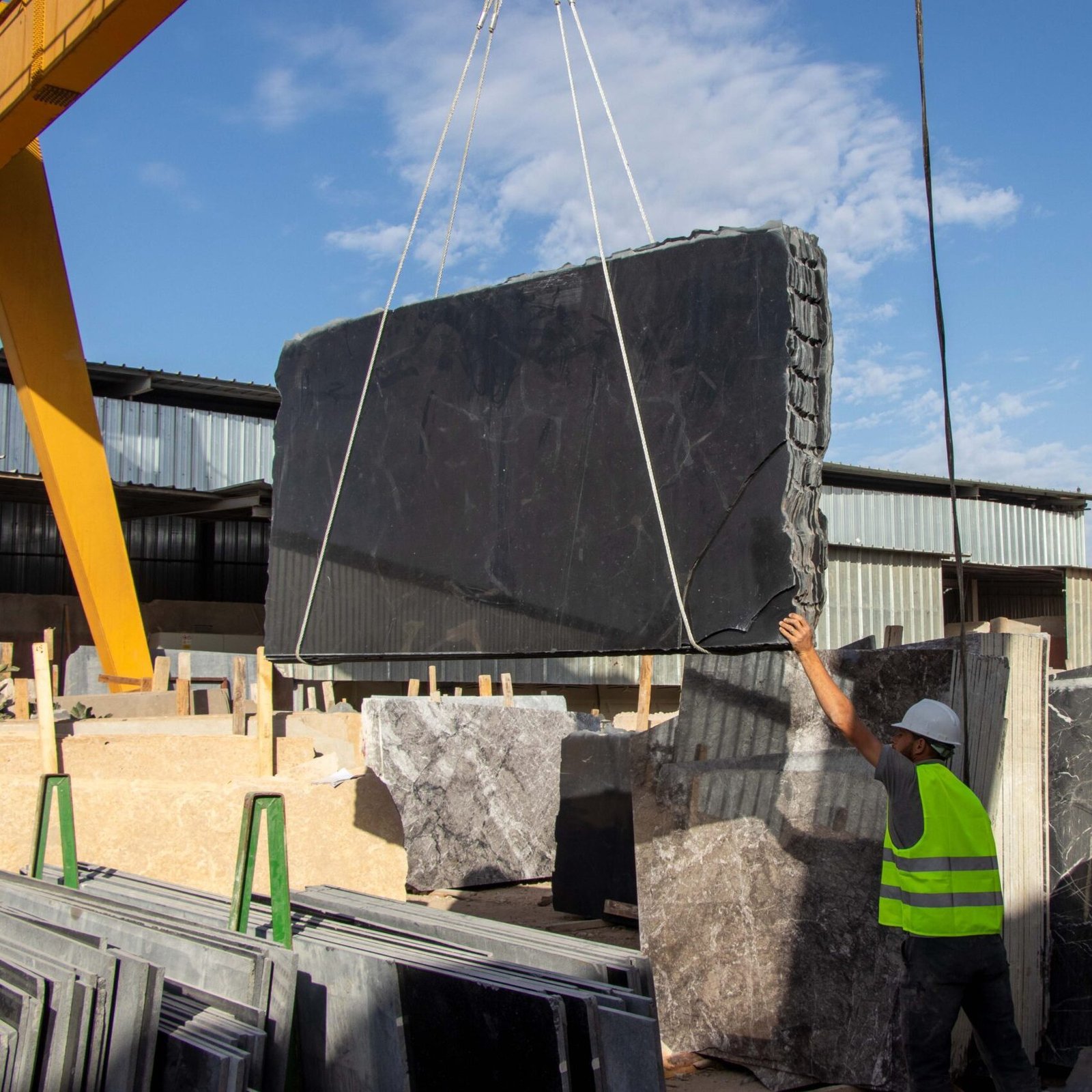 Natural stone slabs organized for selection and international supply